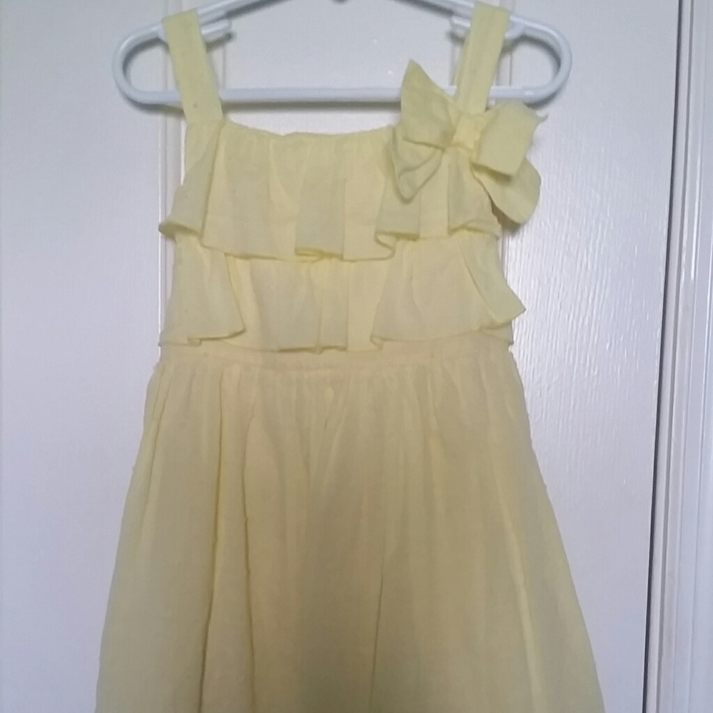 A size 5 Sweet Heart Rose, yellow Easter dress.